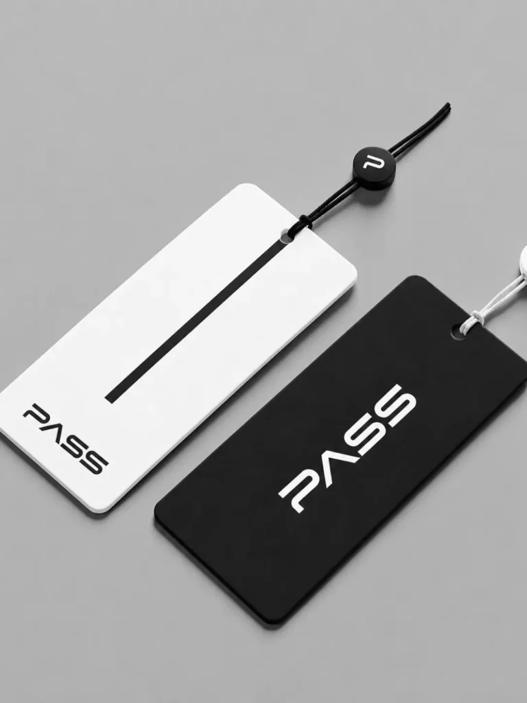 PASS Hang Tag Mockup by Weezeon IT Solution showcasing a premium clothing brand tag design
